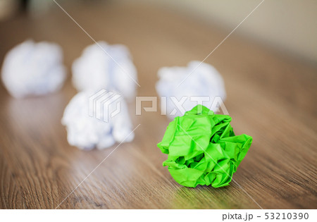 Creative idea concept. Crumpled paper balls on wood background Creative idea concept. Crumpled paper balls on wood background 53210390