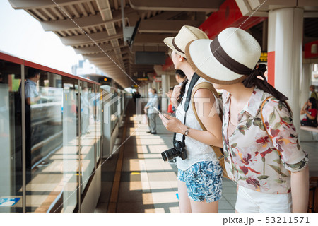 tourists in metro station looking train arrived 53211571