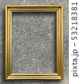 vintage golden picture frame on rust cement wall 53218381