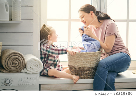 family doing laundry 53219380