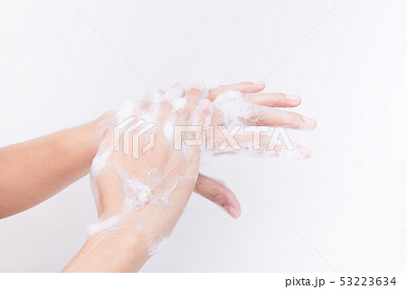 Asian woman hand are washing with soap bubbles Asian woman hand are washing with soap bubbles 53223634