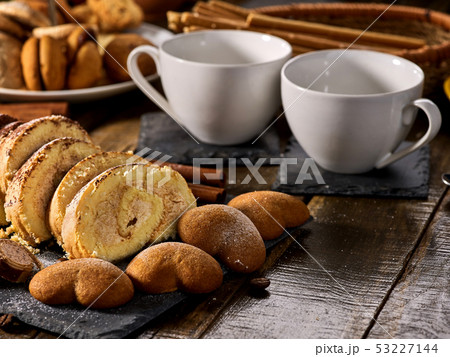 Cookies heart shape, sand rolled biscuit and cinnamon stick 53227144