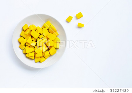 Green pumpkin pieces cut on white 53227489