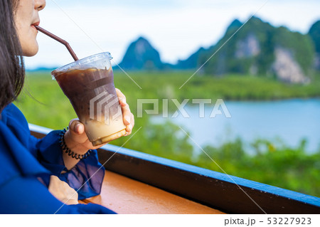 caramel macchiato in plastic glass caramel macchiato in plastic glass 53227923