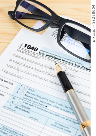 Individual income tax returm form by IRS, concept Individual income tax returm form by IRS, concept 53228604
