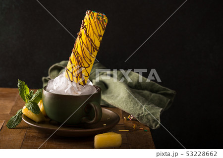 Delicious homemade pineapple popsicles Delicious homemade pineapple popsicles 53228662