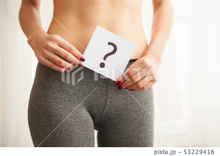 Health. Woman Body In Underwear With Question Card Near Belly Health. Woman Body In Underwear With Question Card Near Belly 53229416