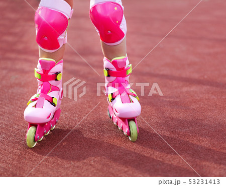 Rollerblades inline skates of a child closeup in Rollerblades inline skates of a child closeup in 53231413