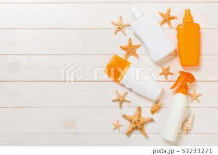 beach accessories on a wooden background top view beach accessories on a wooden background top view 53233271