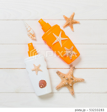 beach accessories on a wooden background top view 53233283