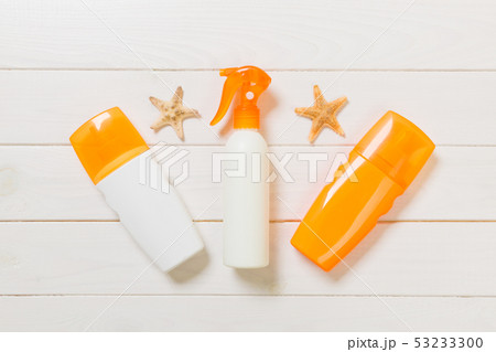 beach accessories on a wooden background top view beach accessories on a wooden background top view 53233300