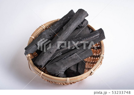 japanese charcoal in bamboo basket 53233748