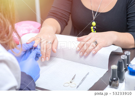 Nail care in salon 53233910