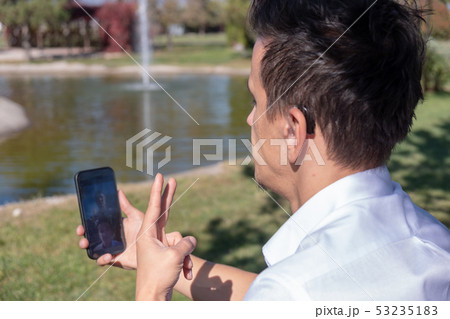 Young boy communicating with sign language Young boy communicating with sign language 53235183