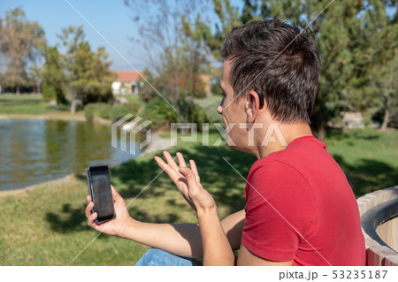 Young boy communicating with sign language 53235187