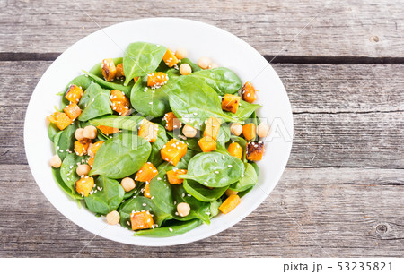 autumn salad with pumpkin , spinach , chickpea and 53235821