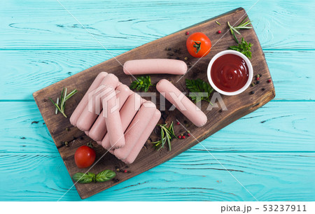 Raw beef sausages with pepper , herbs and ketchup Raw beef sausages with pepper , herbs and ketchup 53237911