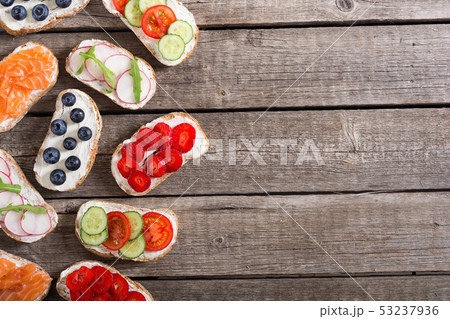 Variation of toast with fruit , vegetable and 53237936