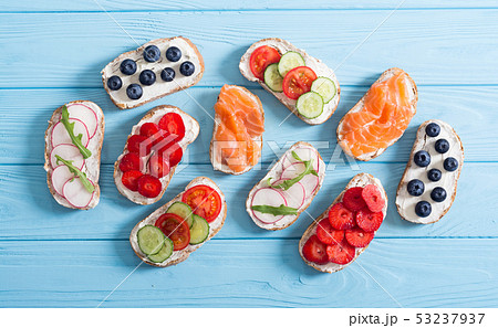 Variation of toast with fruit , vegetable and 53237937