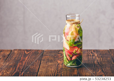 Infused Water with Peach and Basil. 53238253