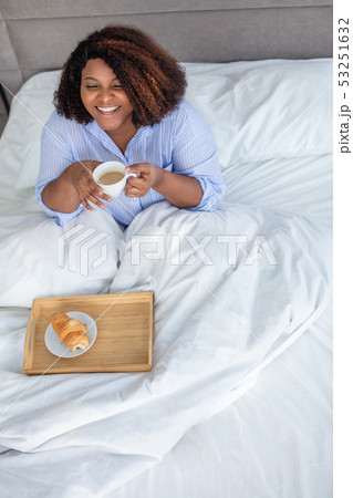 positive beautiful woman having a snack 53251632