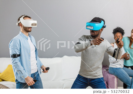International students enjoying together with glasses of virtual reality International students enjoying together with glasses of virtual reality 53270032