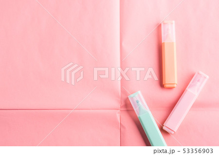Pastel markers on coral pink background Pastel markers on coral pink background 53356903