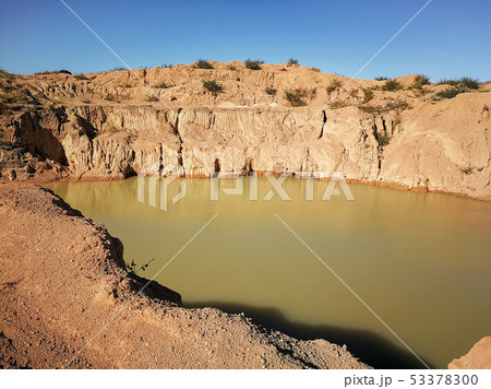 Small water lake at semi precious gems mostly sapphire mine at Ilakaka, Madagascar Small water lake at semi precious gems mostly sapphire mine at Ilakaka, Madagascar 53378300