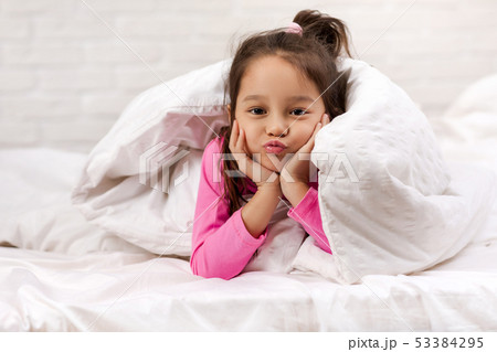 happy morning baby in bed. 53384295