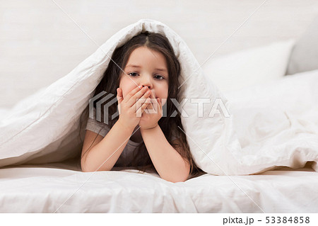 happy morning baby in bed. 53384858