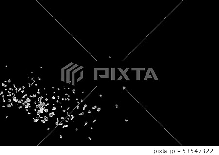 Split debris of stone exploding against black 53547322