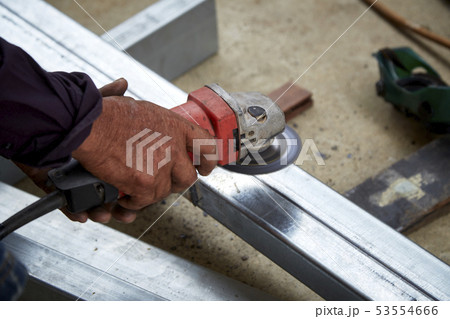 Hand Electric wheel grinding on steel Hand Electric wheel grinding on steel 53554666