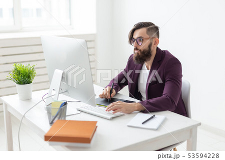 People, designer and technology concept - Man illustrator with thoughtful look, working environment People, designer and technology concept - Man illustrator with thoughtful look, working environment 53594228