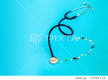 Medicine stethoscope and capsules and pills 53595116