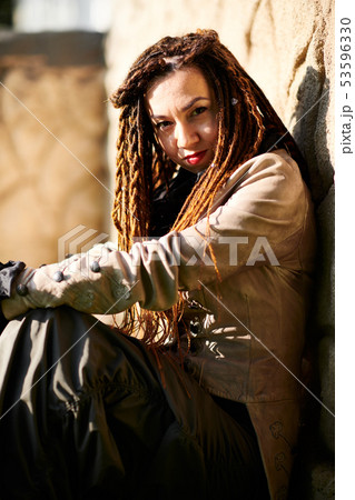 dreadlocks fashionable girl posing in very bright dreadlocks fashionable girl posing in very bright 53596330