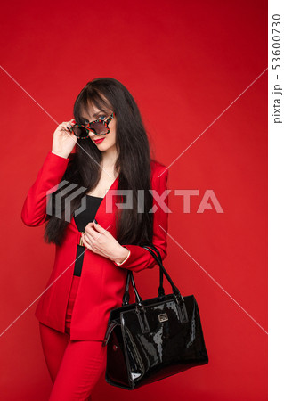 Portrait of young beautiful woman thoughtfully 53600730
