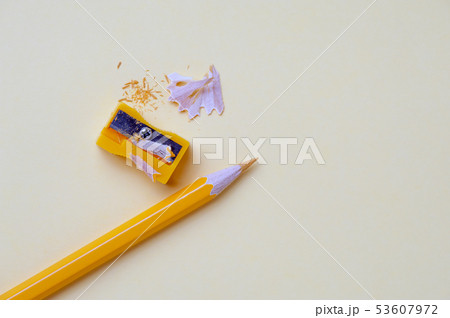 Yellow pencil and metal sharpener on workplace 53607972