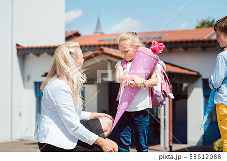 First day in school for little girl 53612088