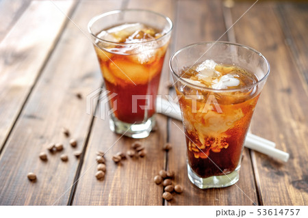 Tasty appetizing refreshing cold coffee with ice in glasses. 53614757