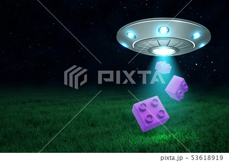 3d rendering of silver metal UFO with violet lego pieces on dark night sky and green grass 53618919