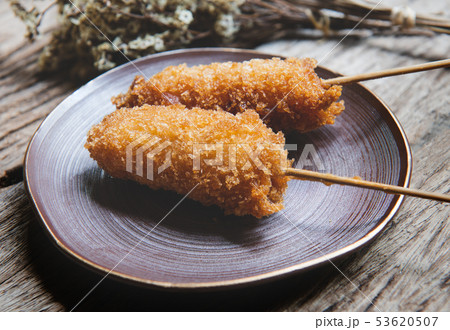Japanese deep fried skewer in round plate. 53620507