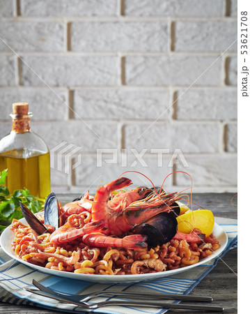 Spanish Fideua, a noodle Paella with seafood 53621708