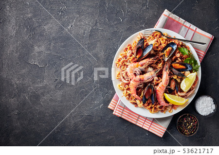 a noodle Paella with seafood, empty space a noodle Paella with seafood, empty space 53621717