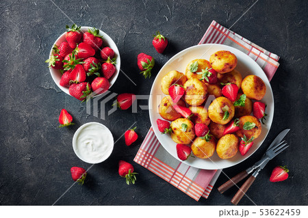cottage cheese sweet donuts served with berries 53622459