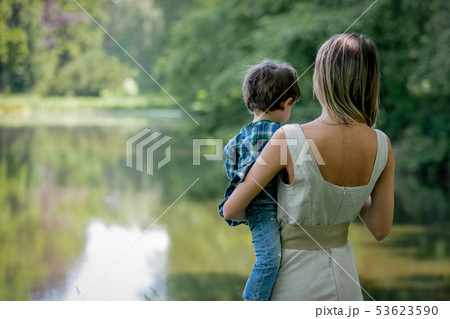 mother holds son on a hands 53623590