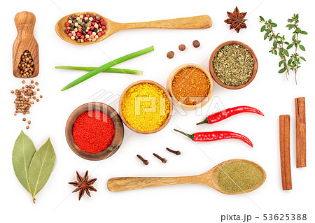 mix of spices in wooden spoon isolated on a white background. Top view. Flat lay. Set or collection mix of spices in wooden spoon isolated on a white background. Top view. Flat lay. Set or collection 53625388