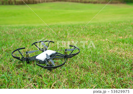 Flying drone above the green grass golf court Flying drone above the green grass golf court 53629975