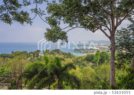 Tropical beach landscape panorama. Beautiful turquoise ocean waives with boats and sandy coastline 53633055