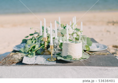 Wedding table with decorations, wedding cake 53636401