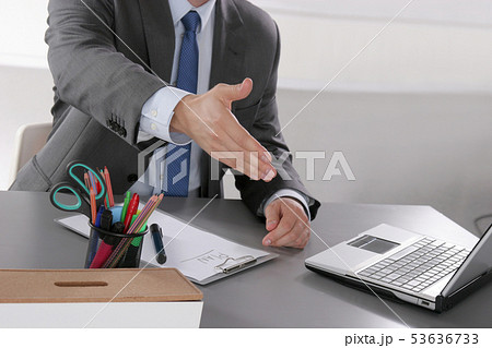 Office desk, Working on a Wooden Table 53636733